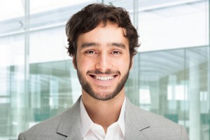 young guy with confident smile