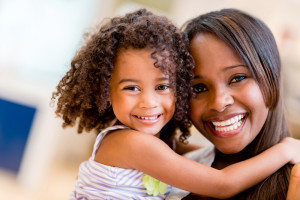 Smiling Mother and Daughter