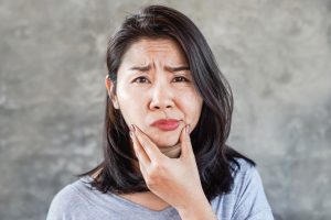 woman with jaw pain