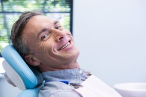 man happy at dental exam