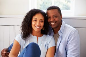 couple with confident, healthy smiles